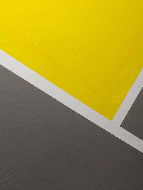 Minimalist geometric wall art with yellow, gray, and white shapes creating a modern abstract design.